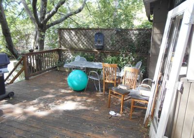 Wood deck on the back of a house after a fire