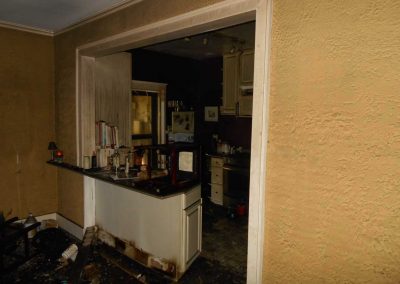 Kitchen area badly damaged from a fire