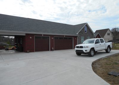 Brick two-car garage that was rebuilt after a complete fire loss