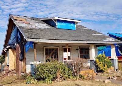 Storm damaged exterior of a home