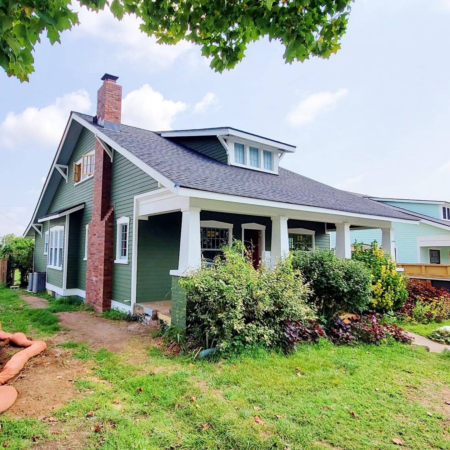 Professional air scrubber setup for ceiling drying and mold prevention in a Nashville, TN home by Blue Chip Restoration.