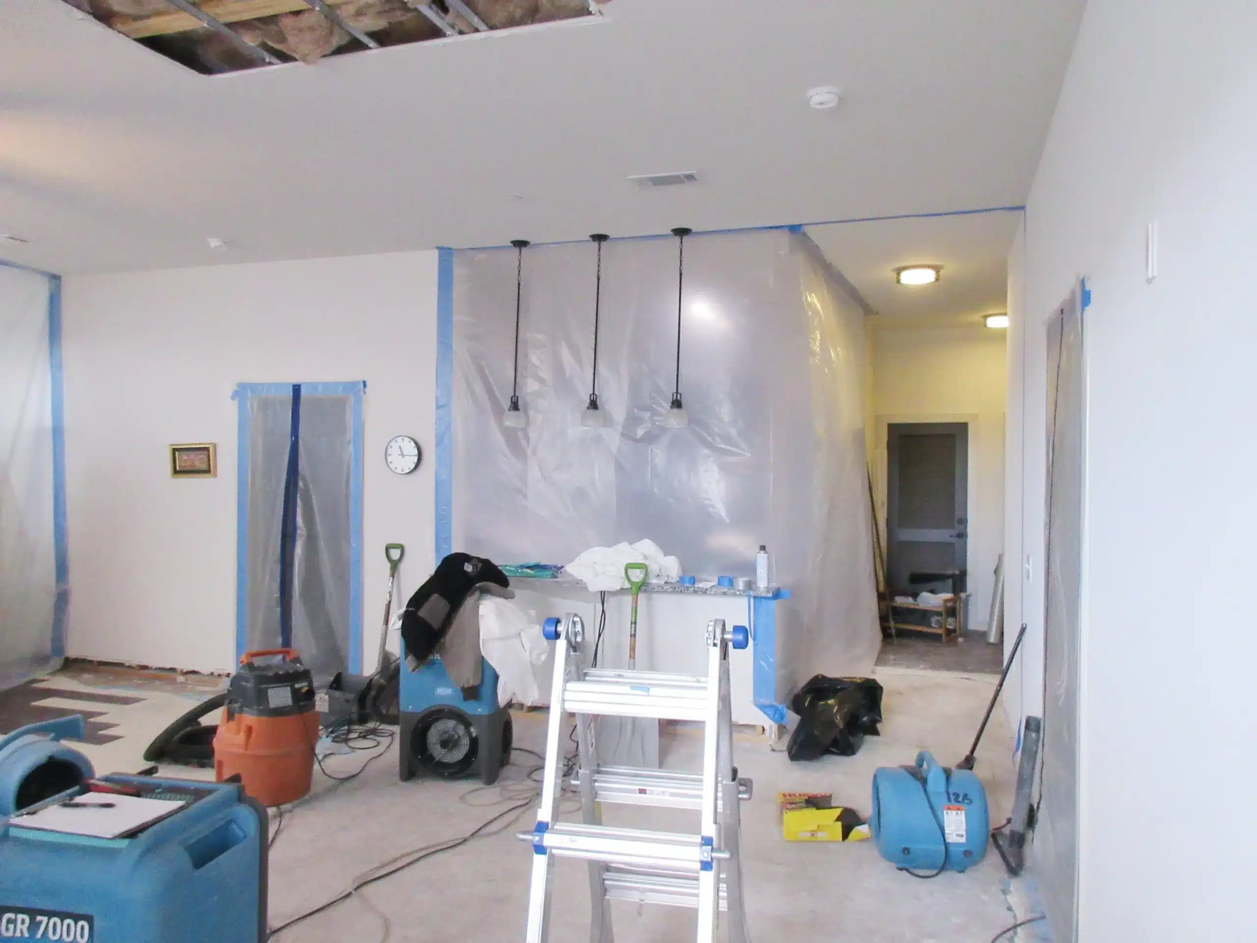 Water damage restoration equipment inside a Franklin, TN home